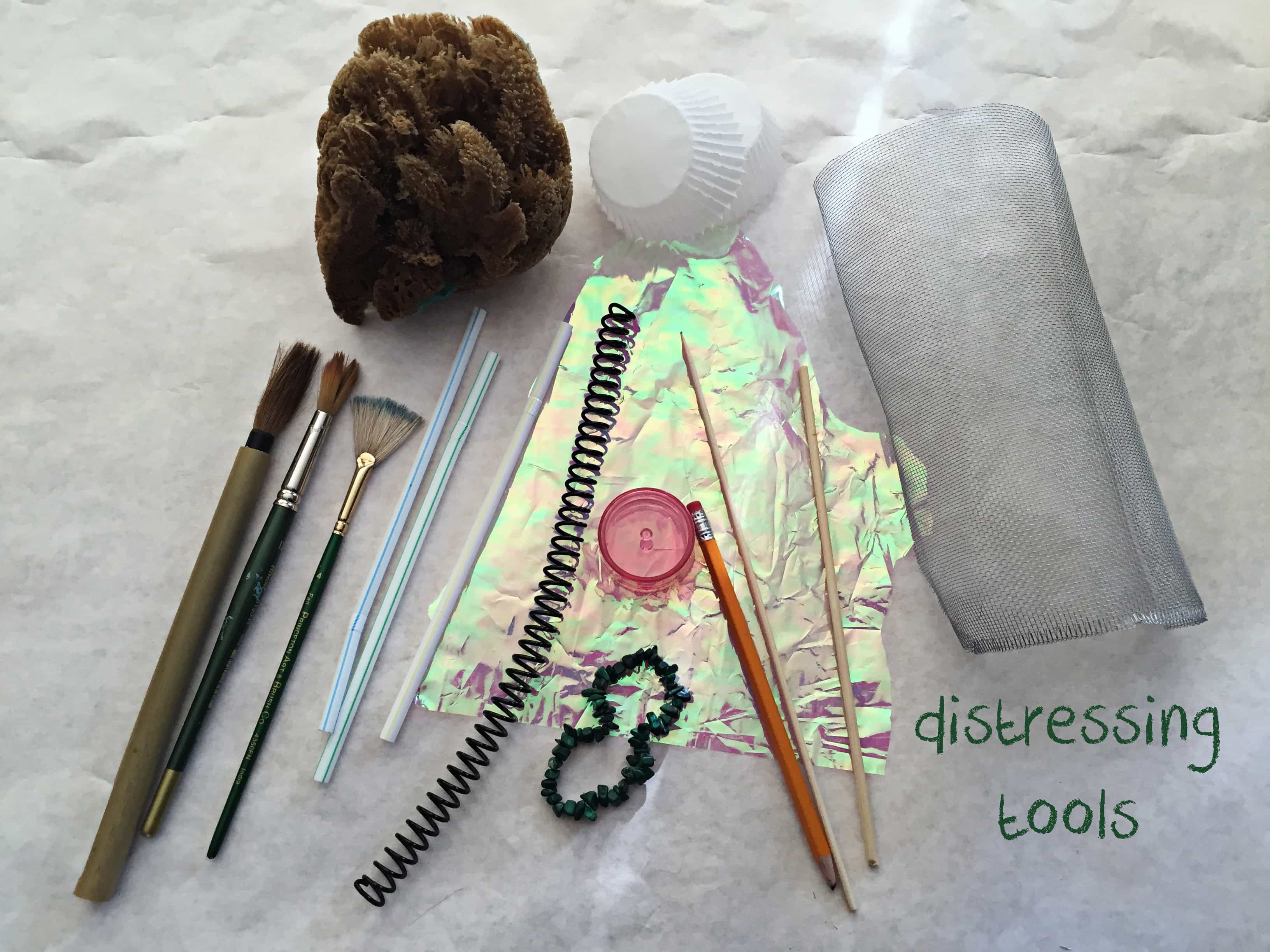 Tools for pattern making including sponges and paintbrushes.