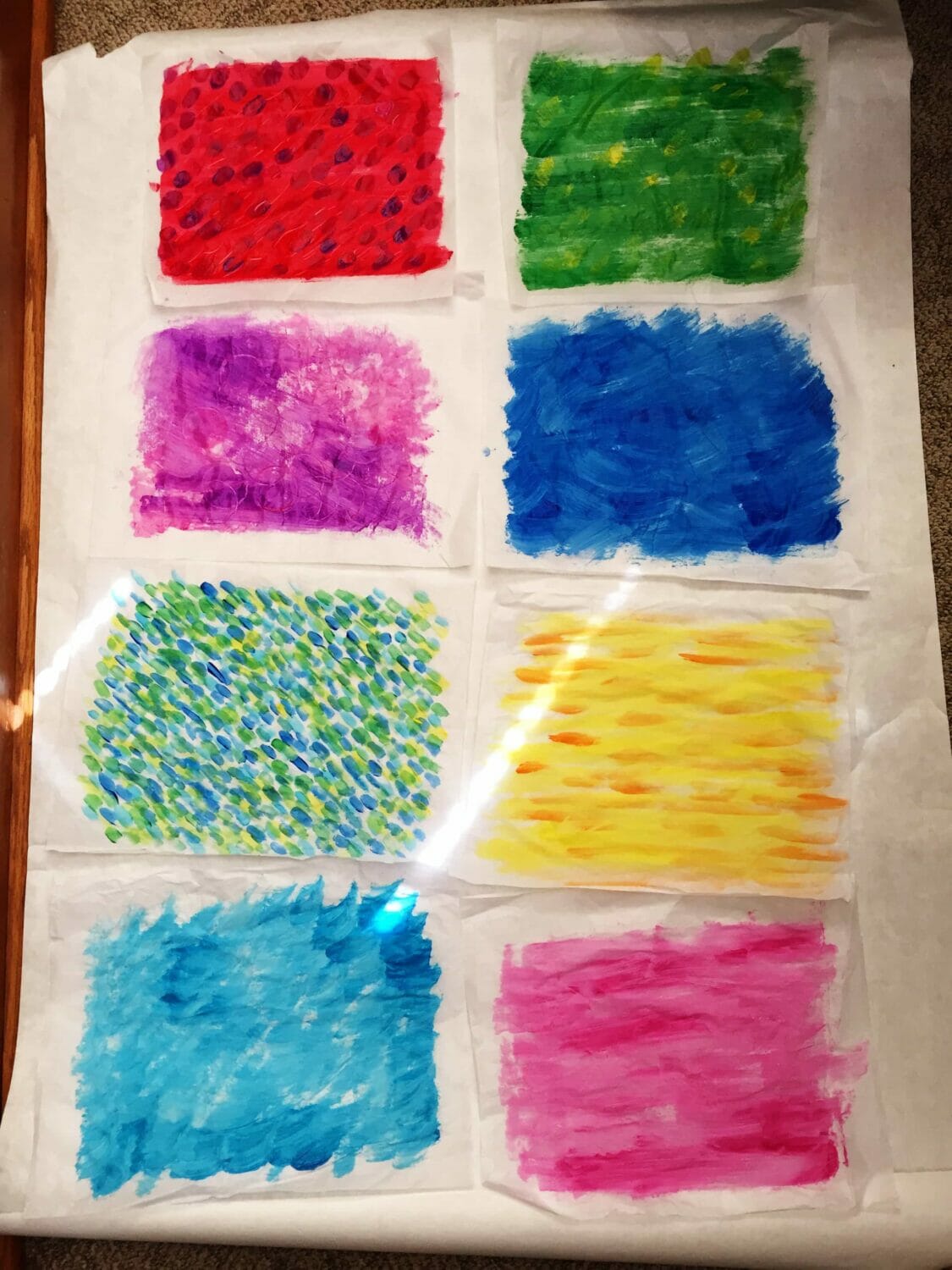 Hand painted tissue paper in the technique Eric Carle uses.
