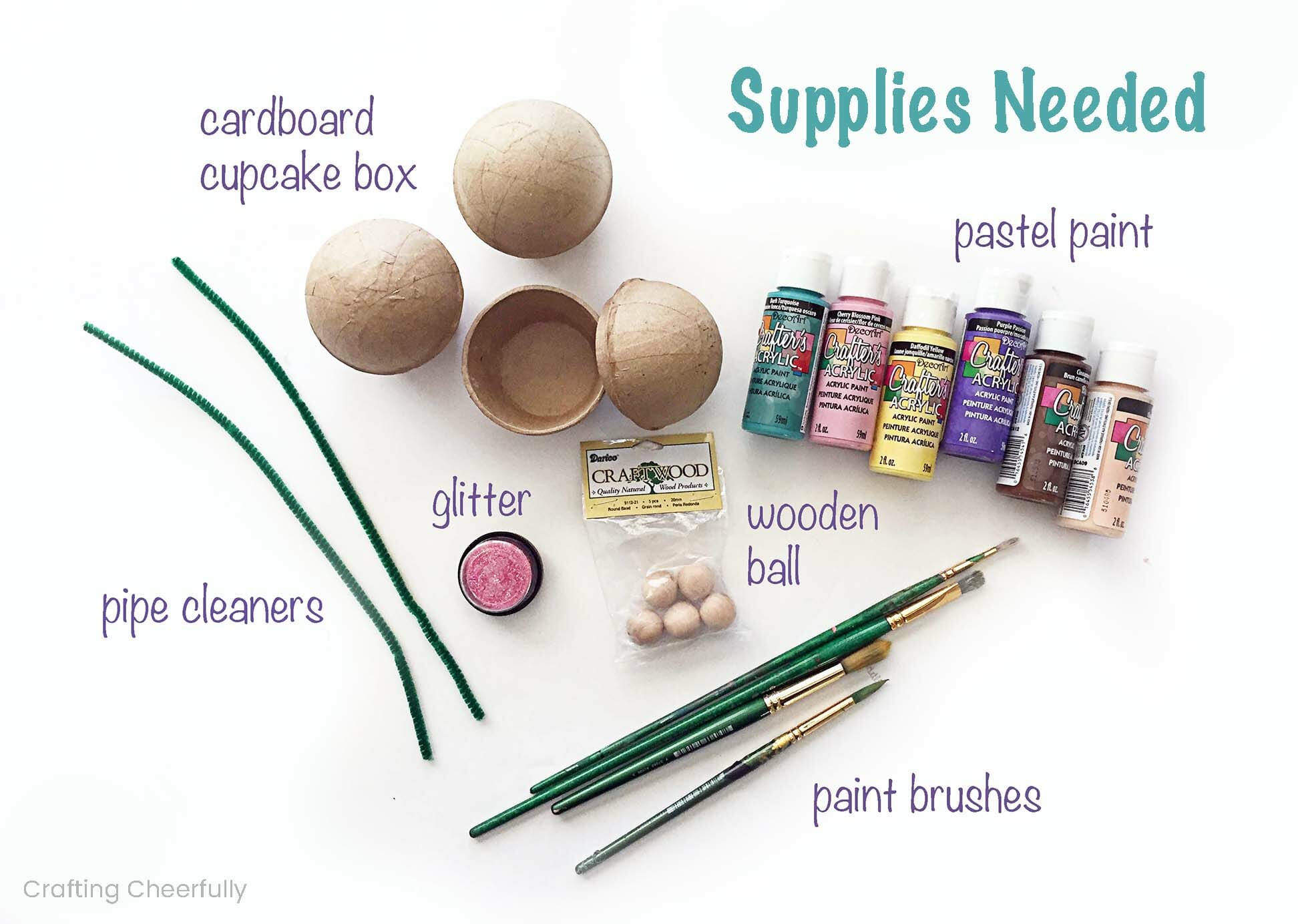 Acrylic paint, pipe cleaners, wooden balls, cupcake boxes and paint brushes.