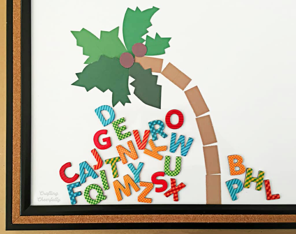 Chicka Chicka Boom Boom magnetic board with palm tree falling over and letters tumbling downl