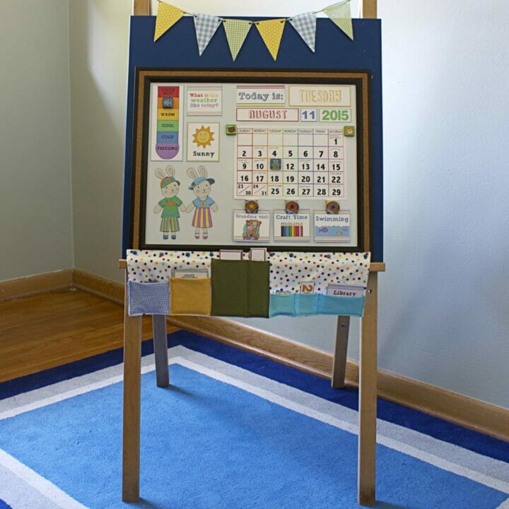 Chalkboard with magnet holder made from fabric.