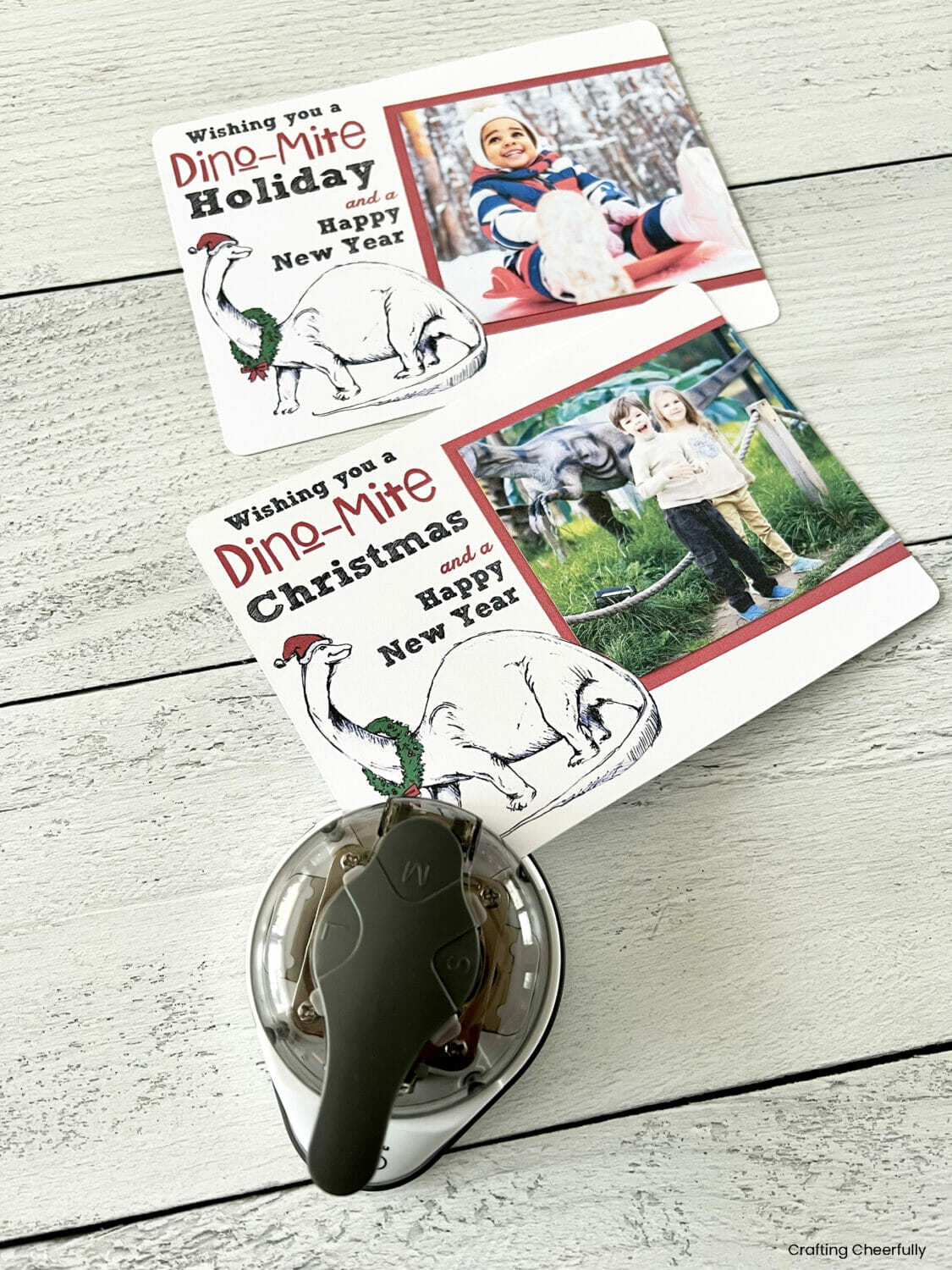 A corner punch is used to round the corners of the holiday cards.