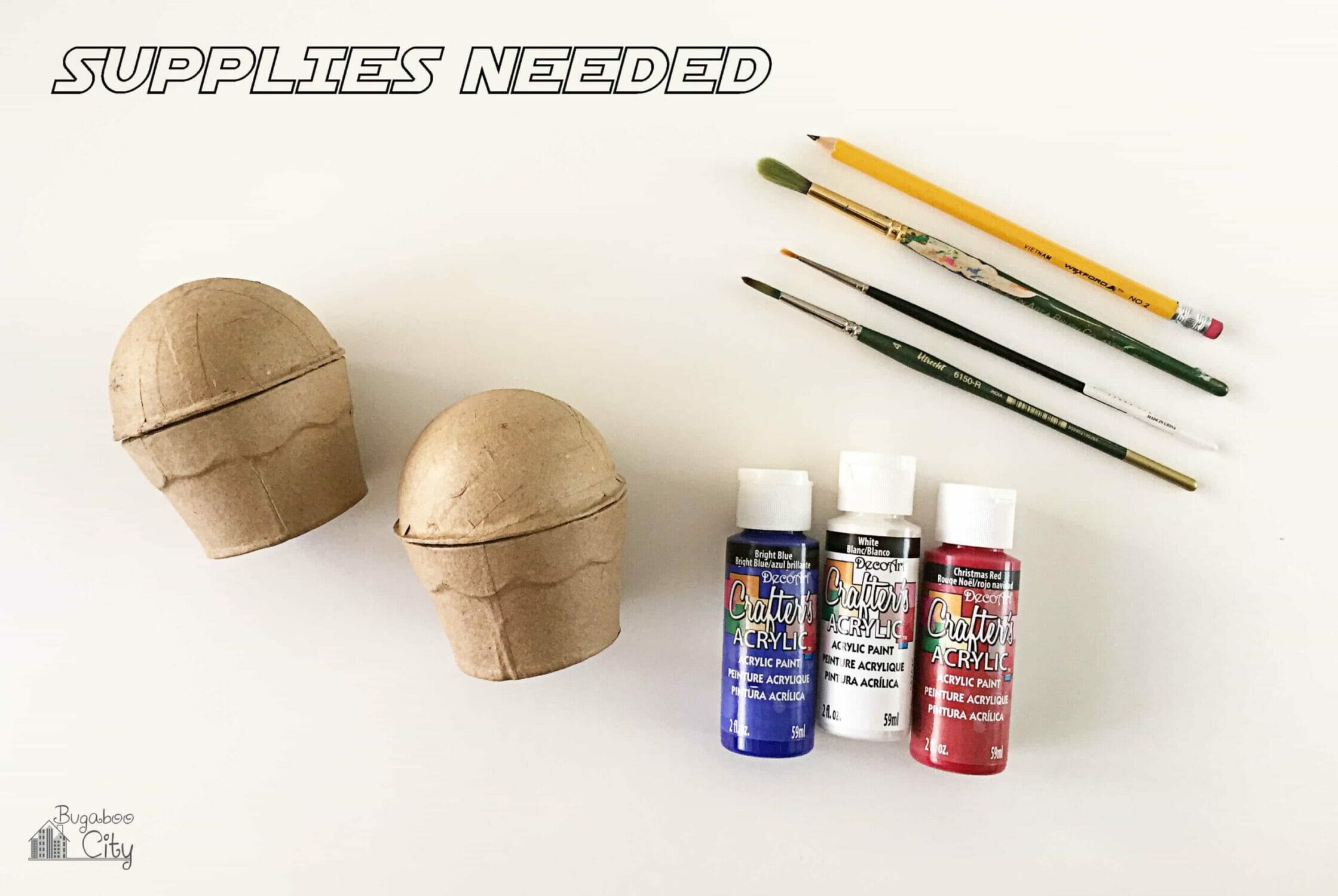Cupcake paper mache boxes, acrylic paint and paint brushes.