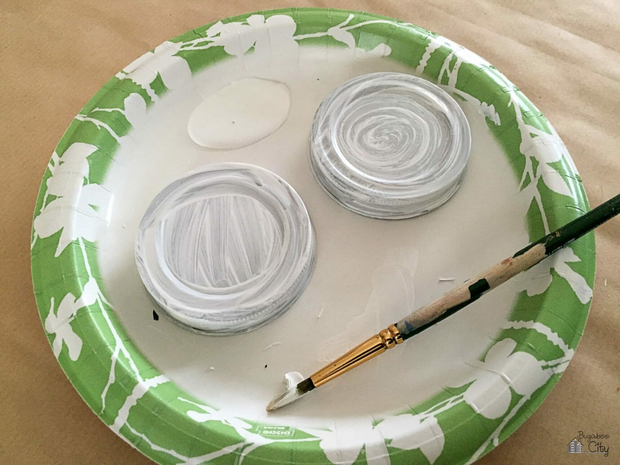 Mason jar lids are painted white.