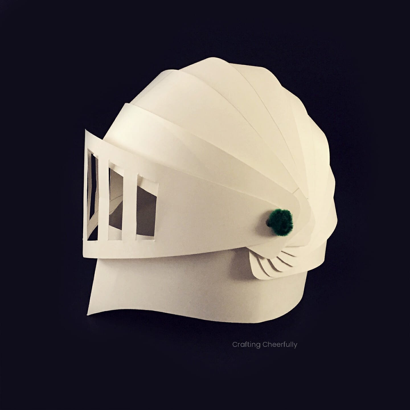 Knight helmet made from white poster board.