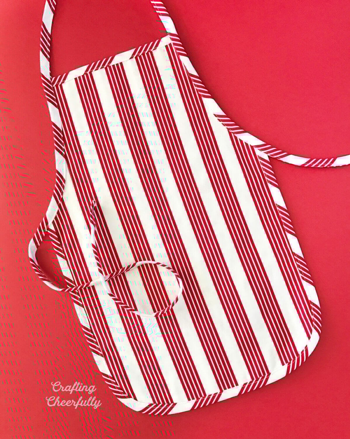 The back of the apron showing the red and white striped fabric.