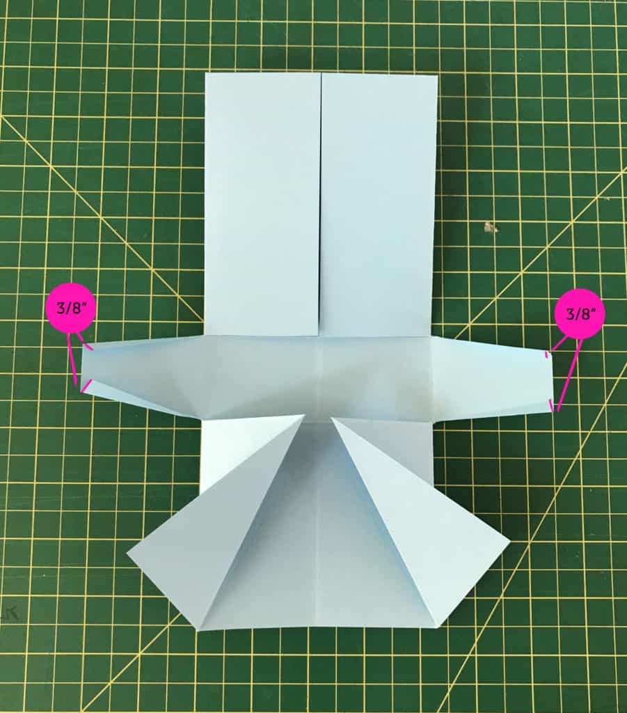 The cut tabs are marked at 3/8" and diagonally folded from these marks.