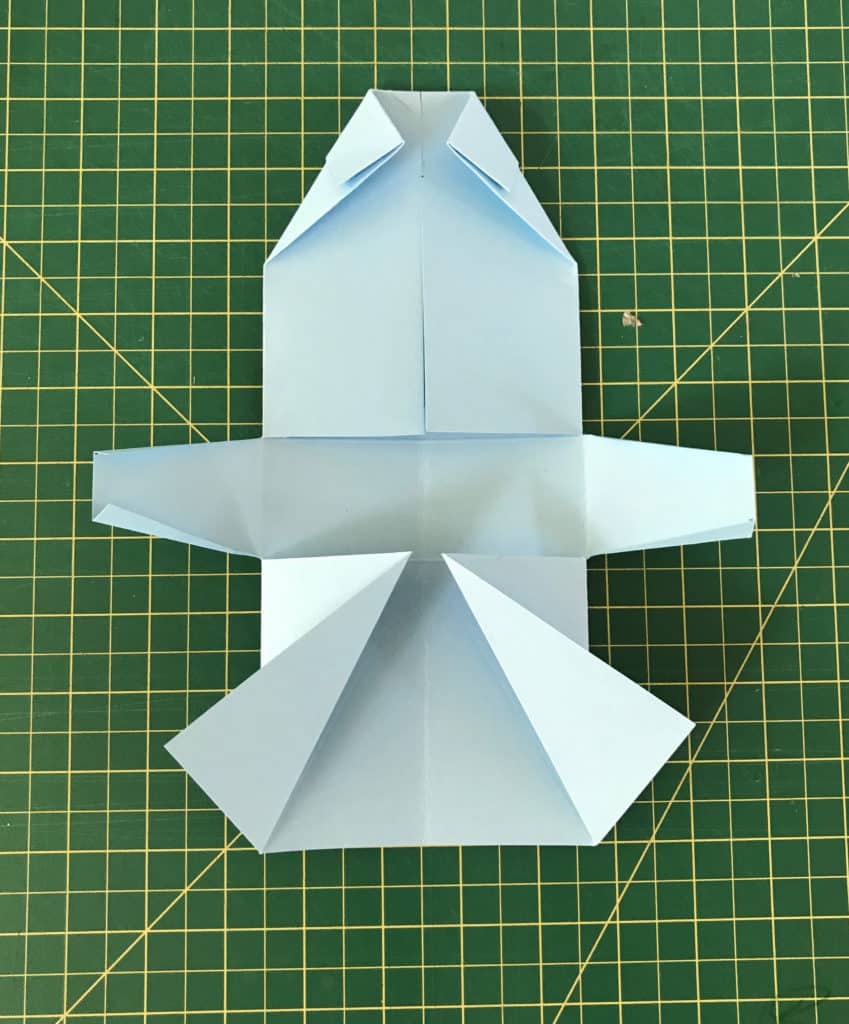 The collar is folded along the diagonal lines.