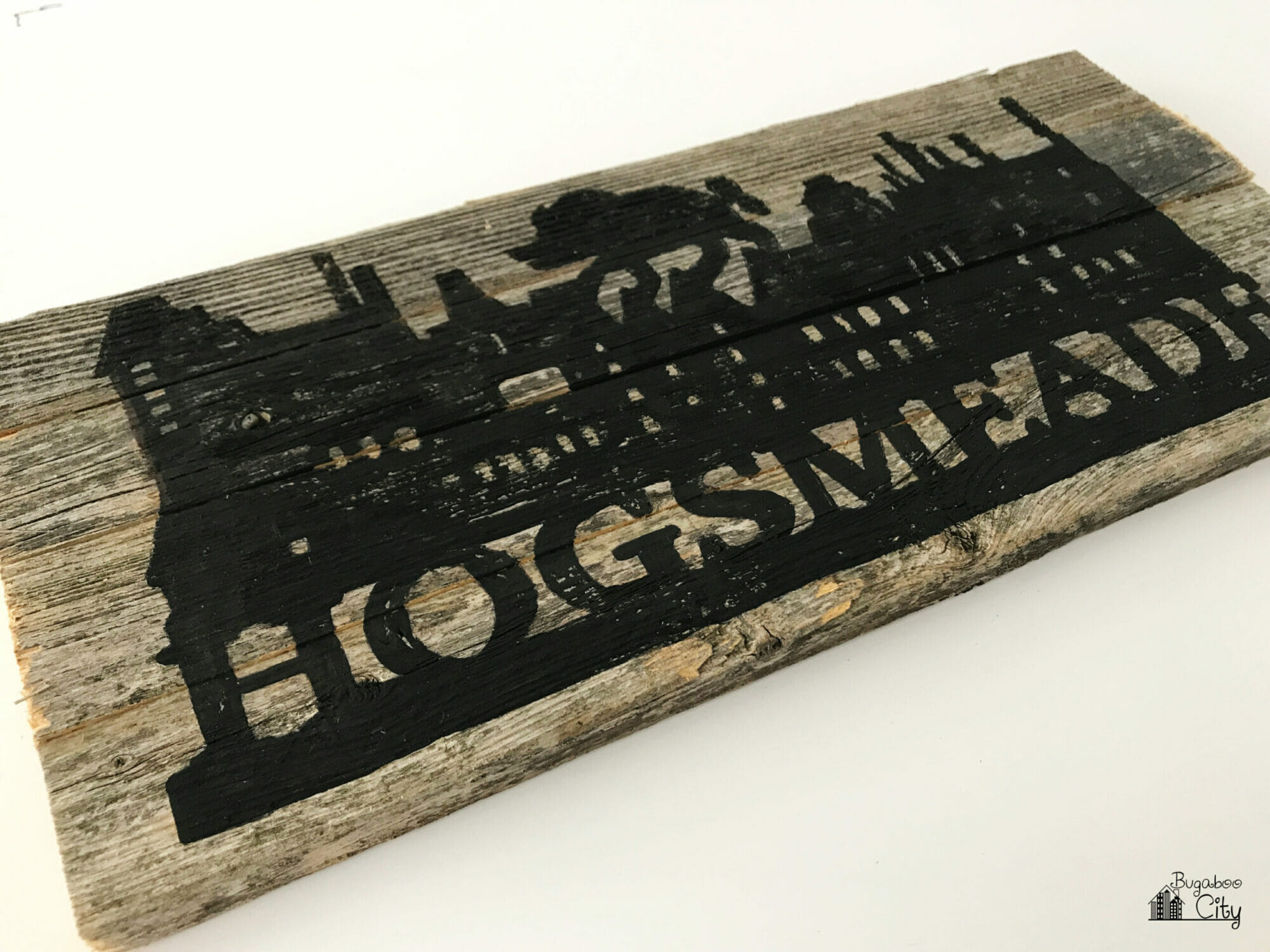 The hogsmeade sign is filled in with black acrylic paint.