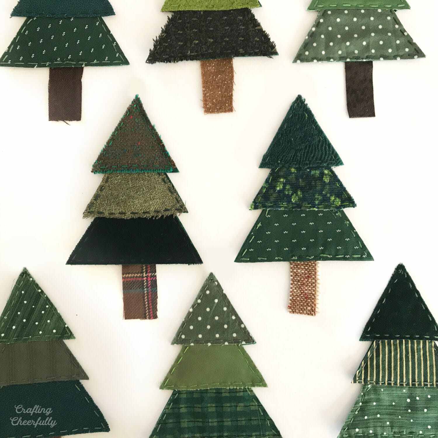 Christmas tree banner made with fabric scraps and felt. 