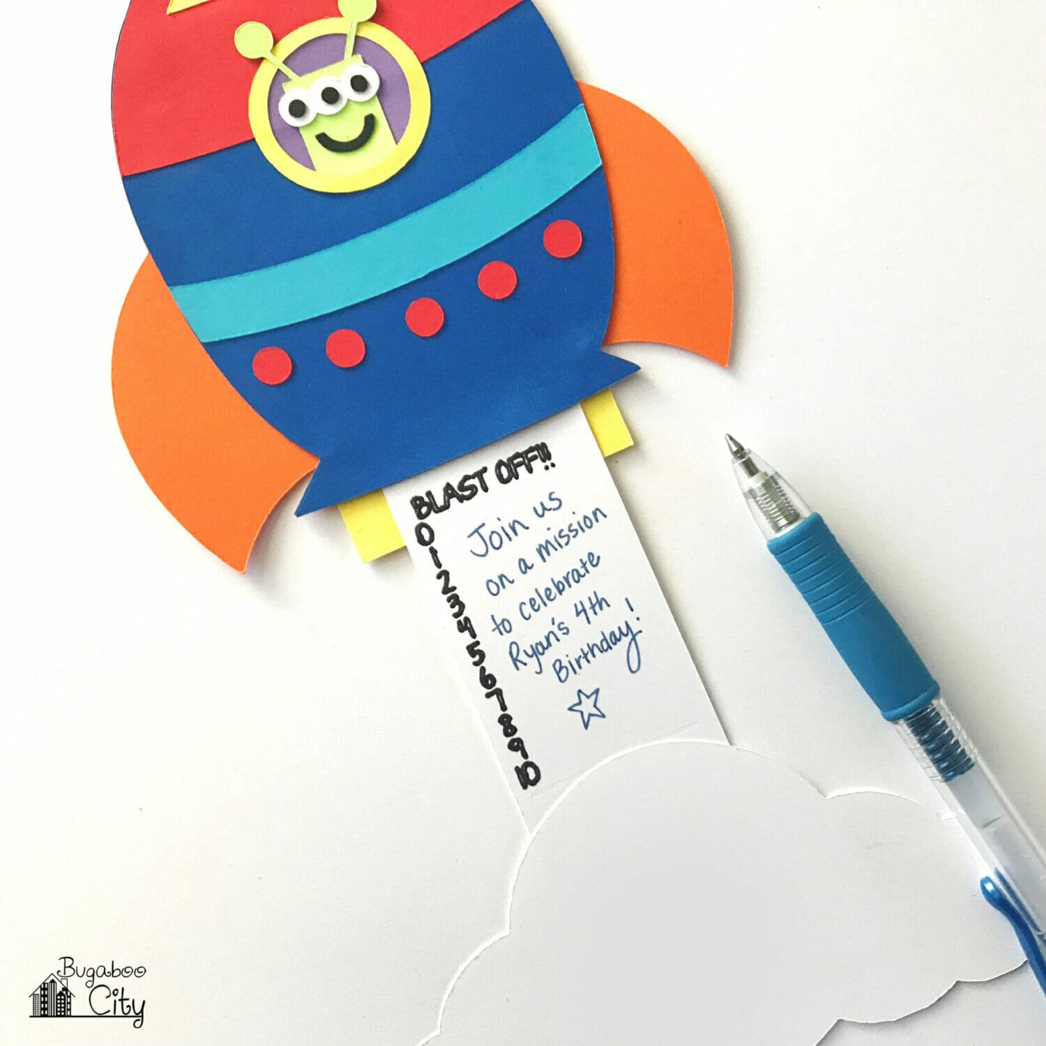 A handwritten not is added to the slider card, it reads ' Join us on a mission to celebrate Ryan's 4th birthday!'