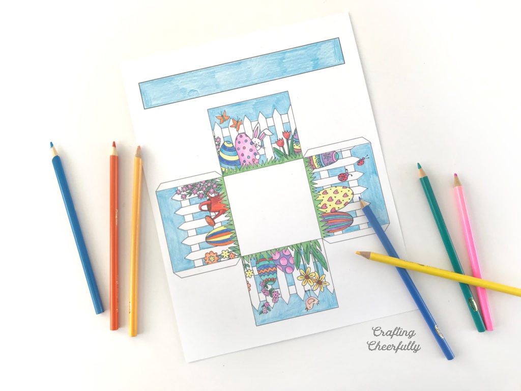 Easter coloring page is colored in with colored pencil.