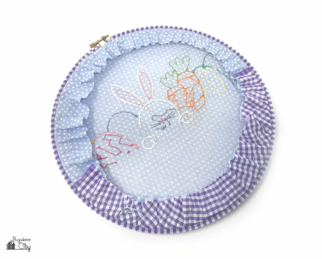 The back of an Easter bunny embroidery hoop.