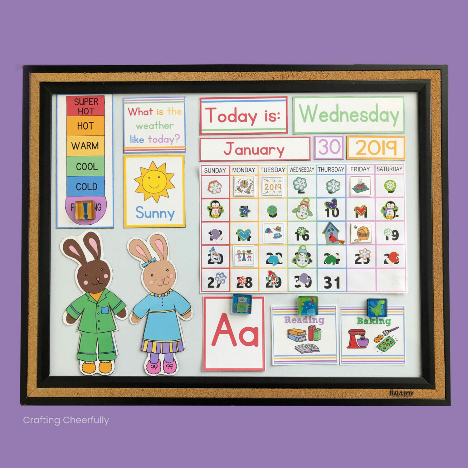 Colorful children's calendar with calendar, weather, days of the week and alphabet cards displayed on it.