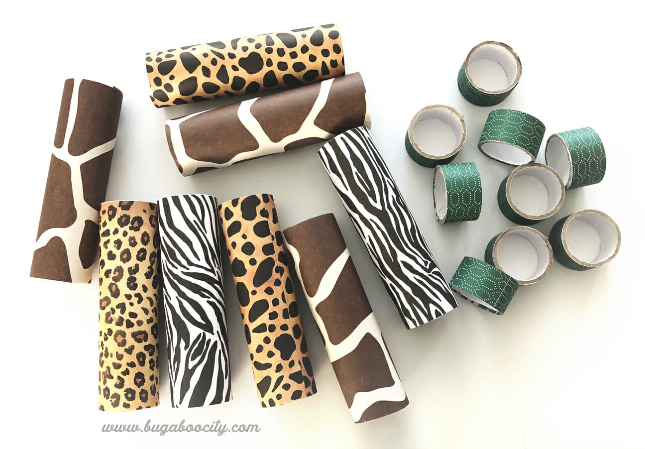 Cardboard tubes wrapped in animal print paper.