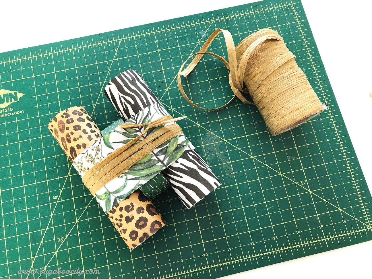 Raffia is wrapped around the binoculars for decoration.