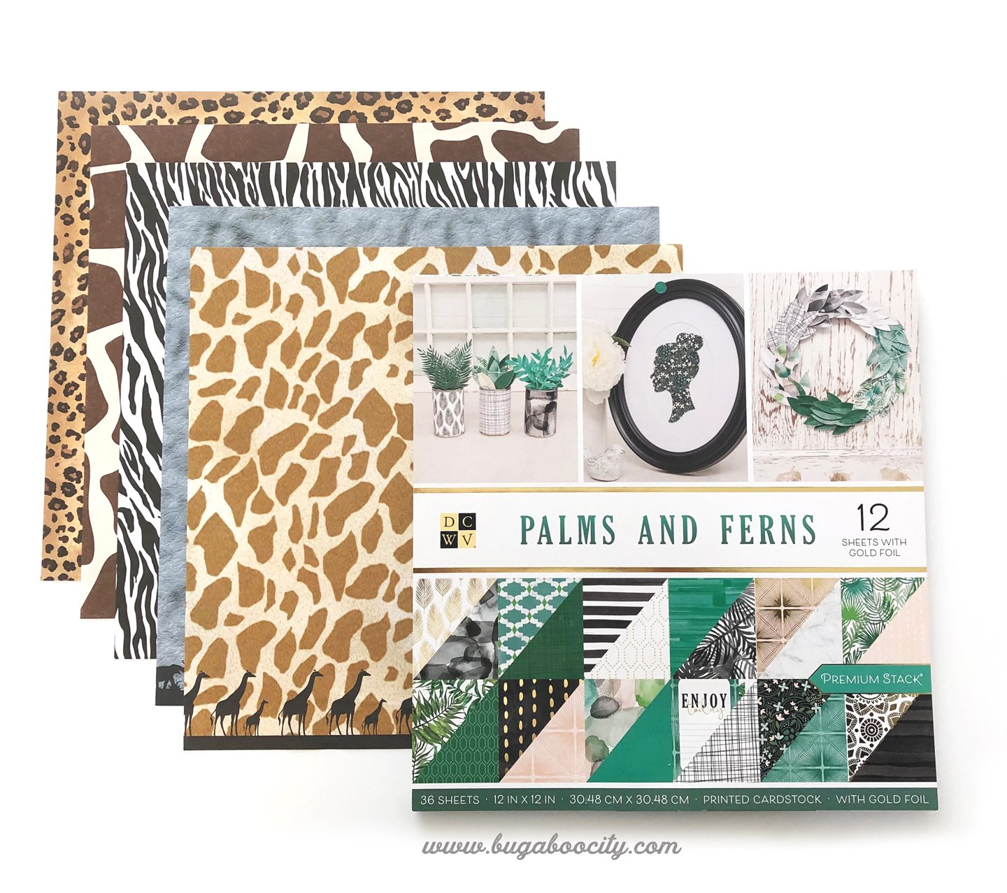 Sheets of animal print papers and a paper stack called Palms and Ferns.