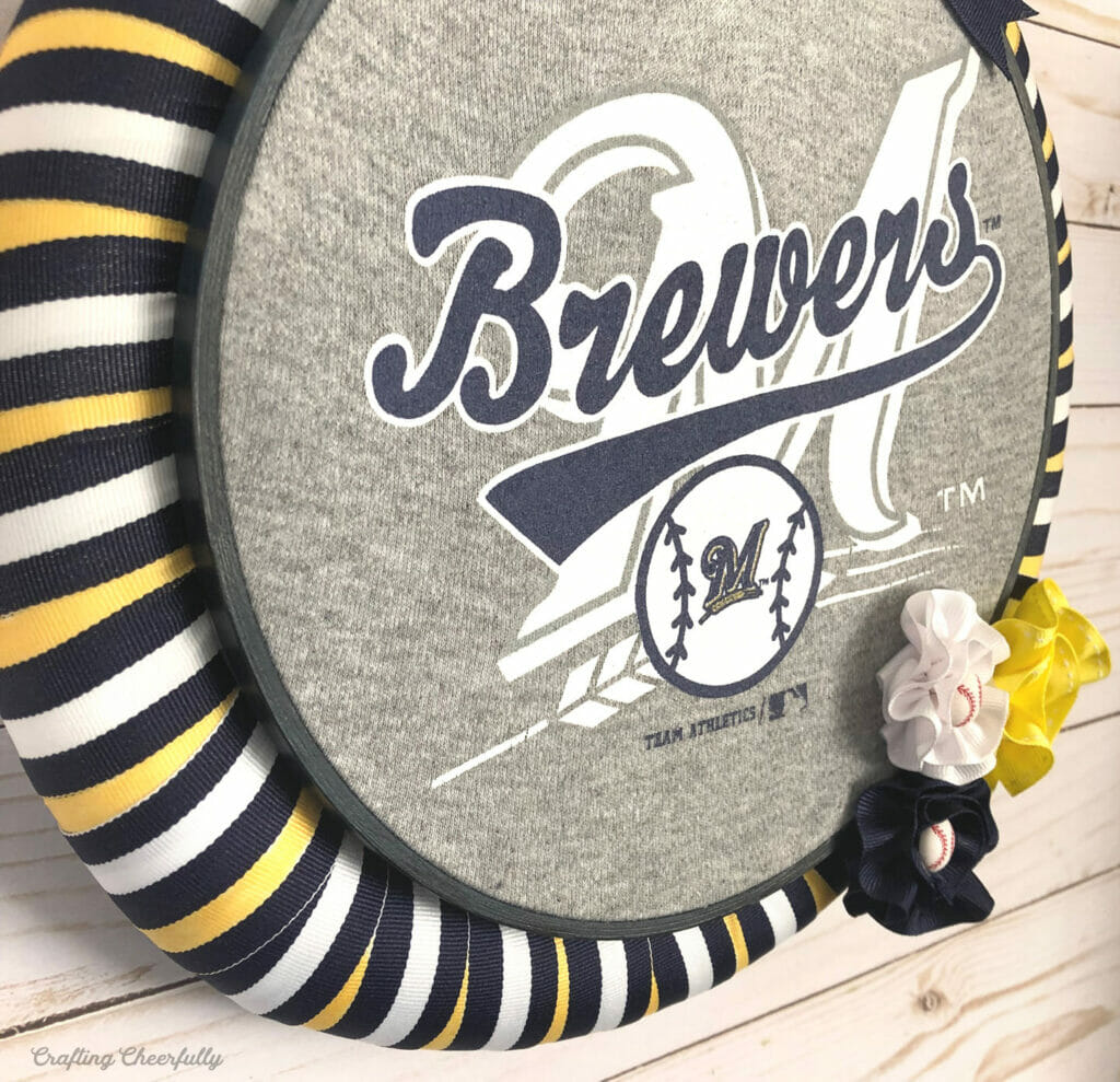 Upcycled baseball wreath made from old clothes and ribbon.