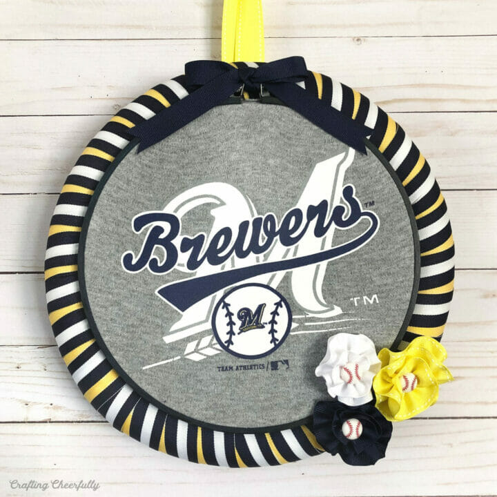 Upcycled baseball wreath made from old clothes and ribbon.