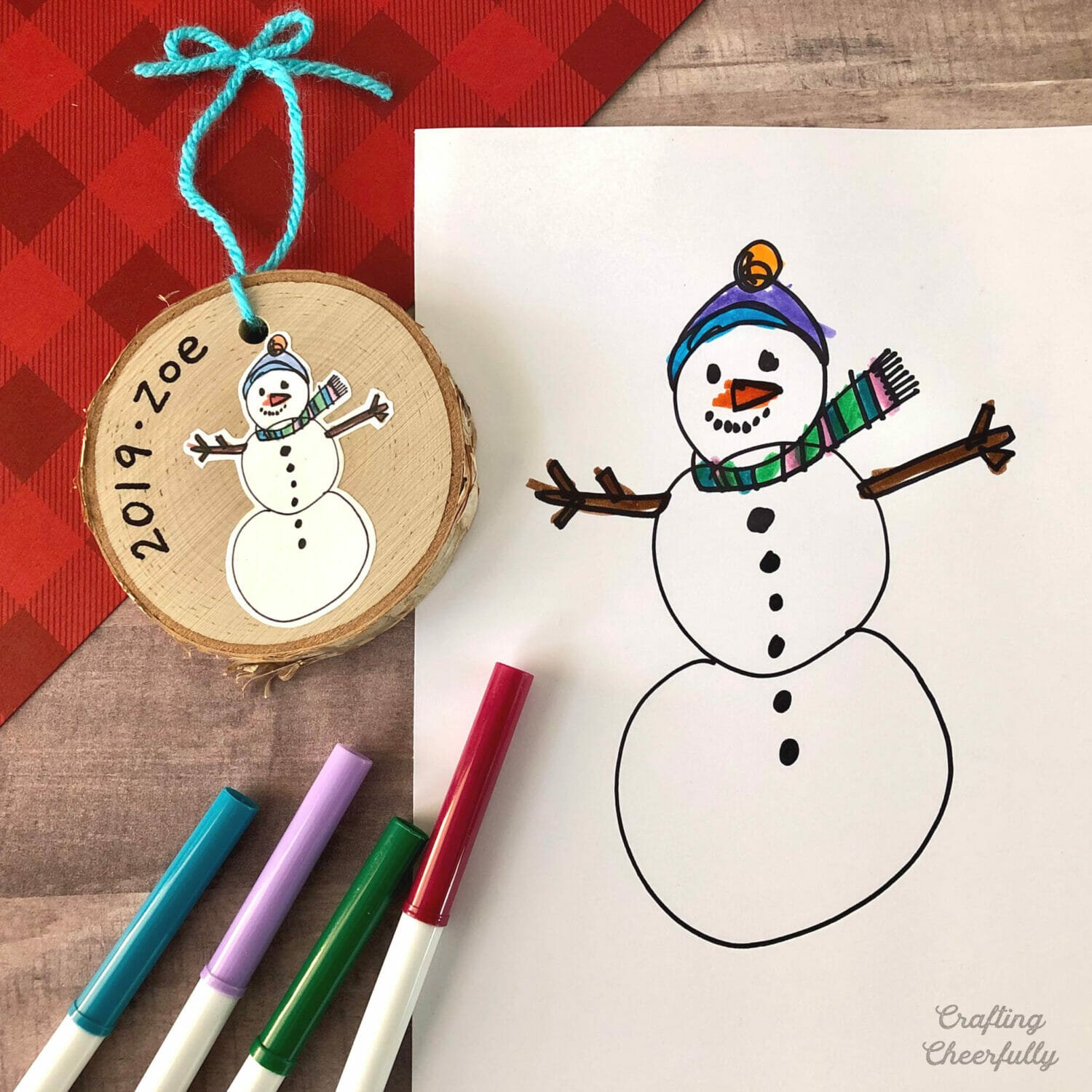 Wood slide ornament made from kid's artwork!