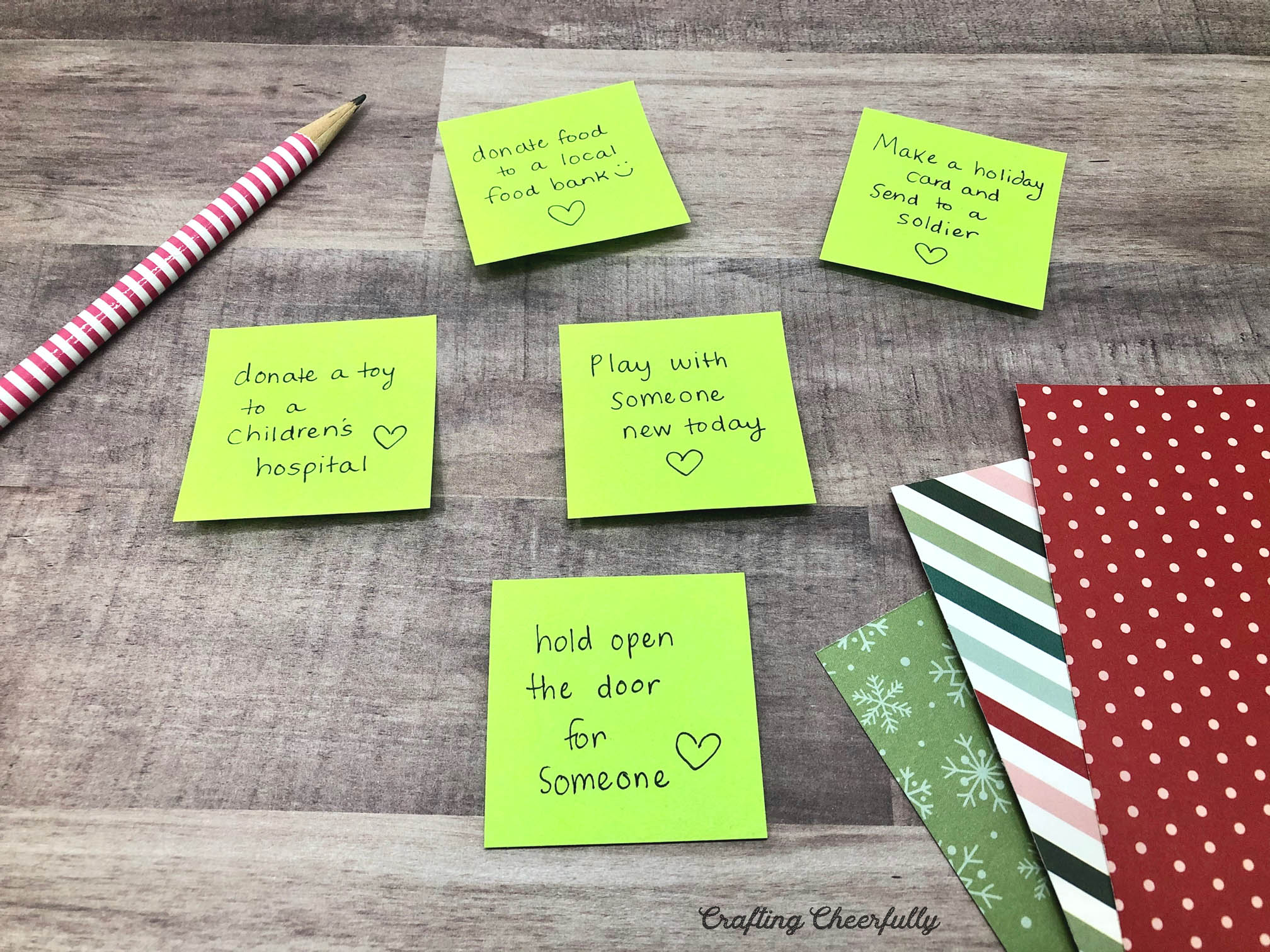 Post-it notes with acts of kindness written on them.