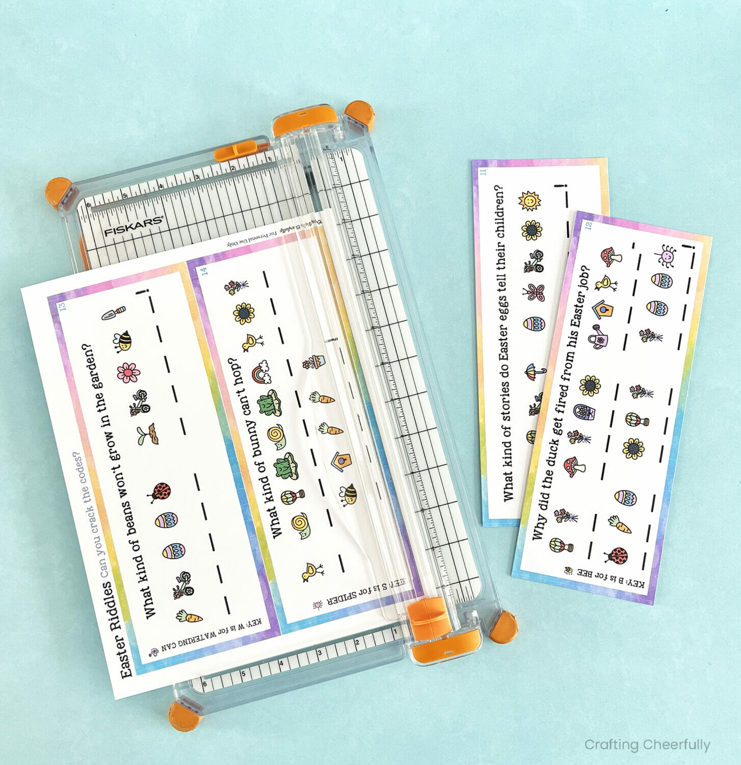 Riddles are cut out using a paper trimmer.