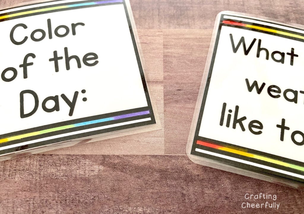 Two calendar cards lay next to each other, one has curved corners.