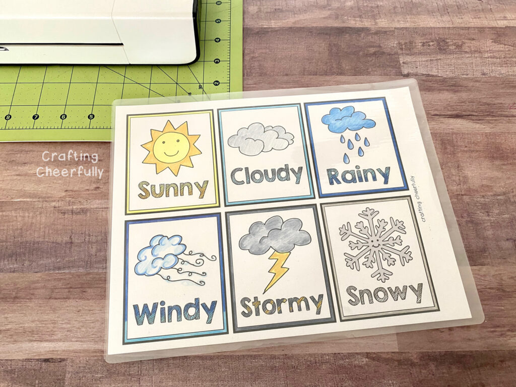 Printable with weather cards are colored in and laminated.