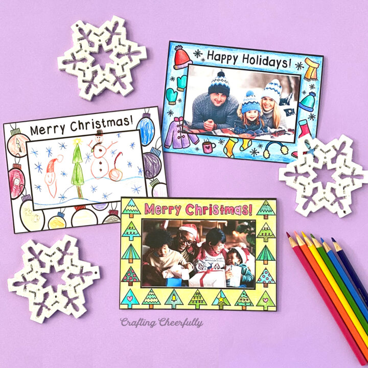 Holiday photo card s colored with colored pencil on a purple background with white snowflakes.