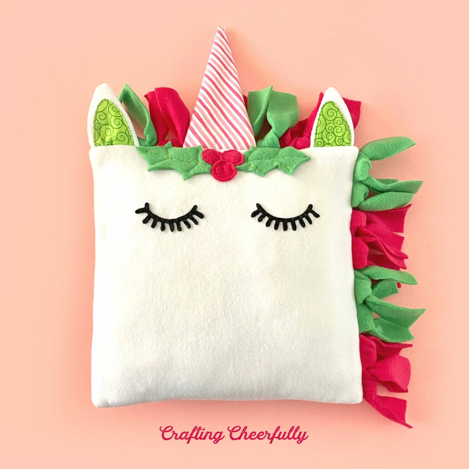 https://www.craftingcheerfully.com/wp-content/uploads/2020/11/Holiday-Christmas-Unicorn-Pillow.jpg