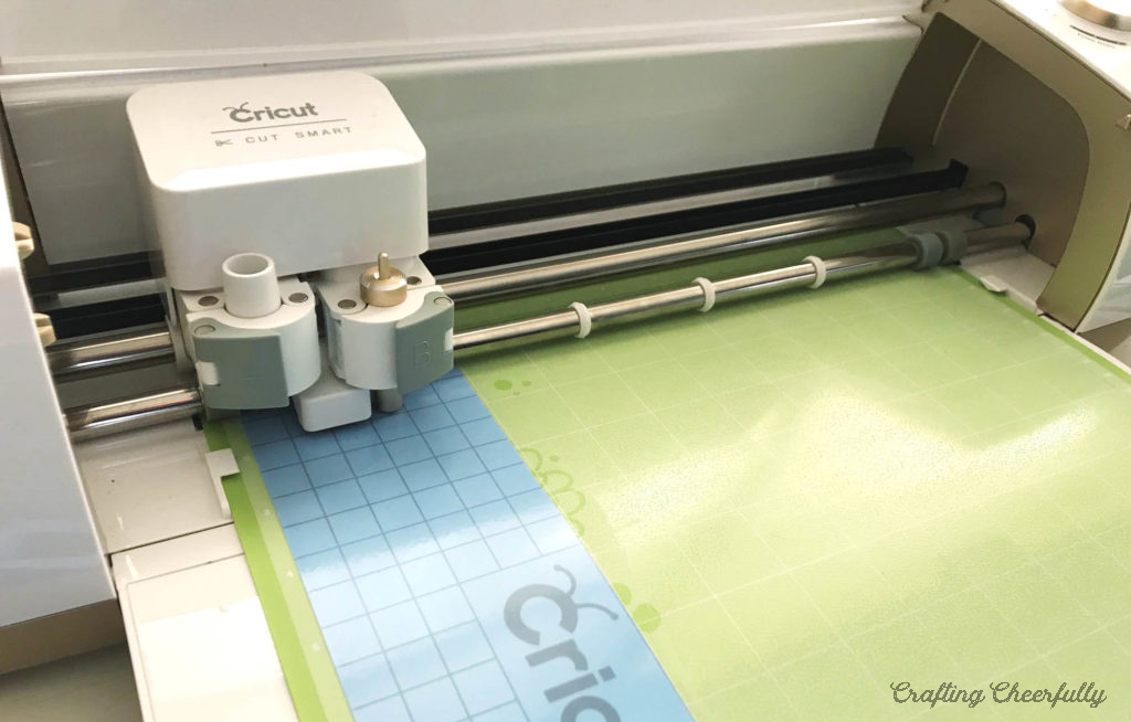 Cricut cutting machine cutting stencil material.