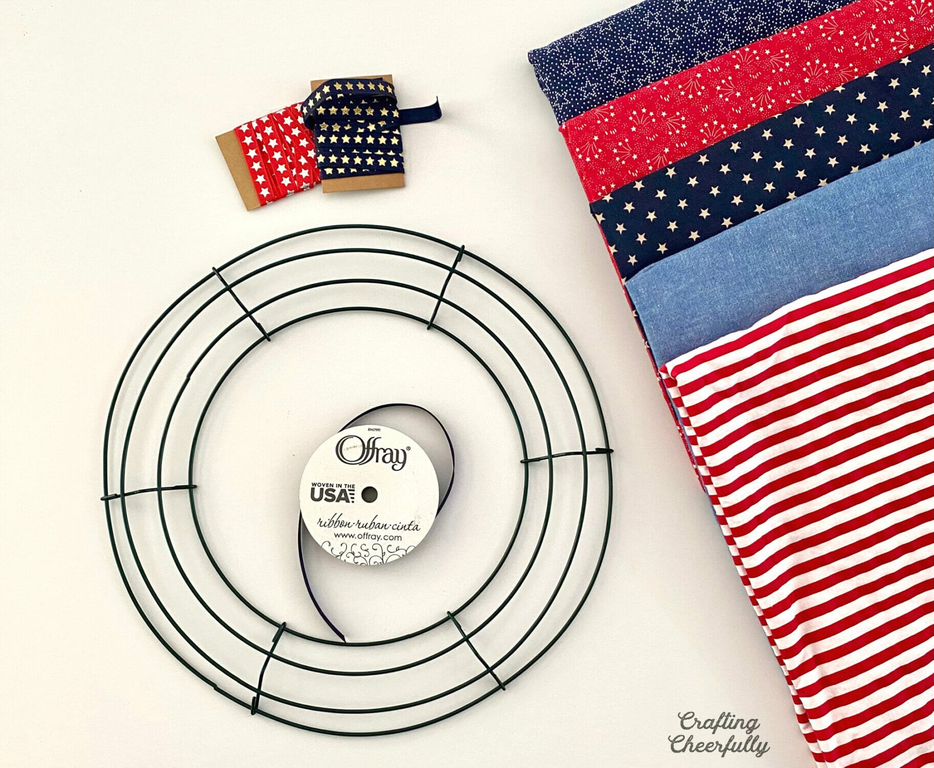 Supplies needed to make a patriotic pillow wreath.