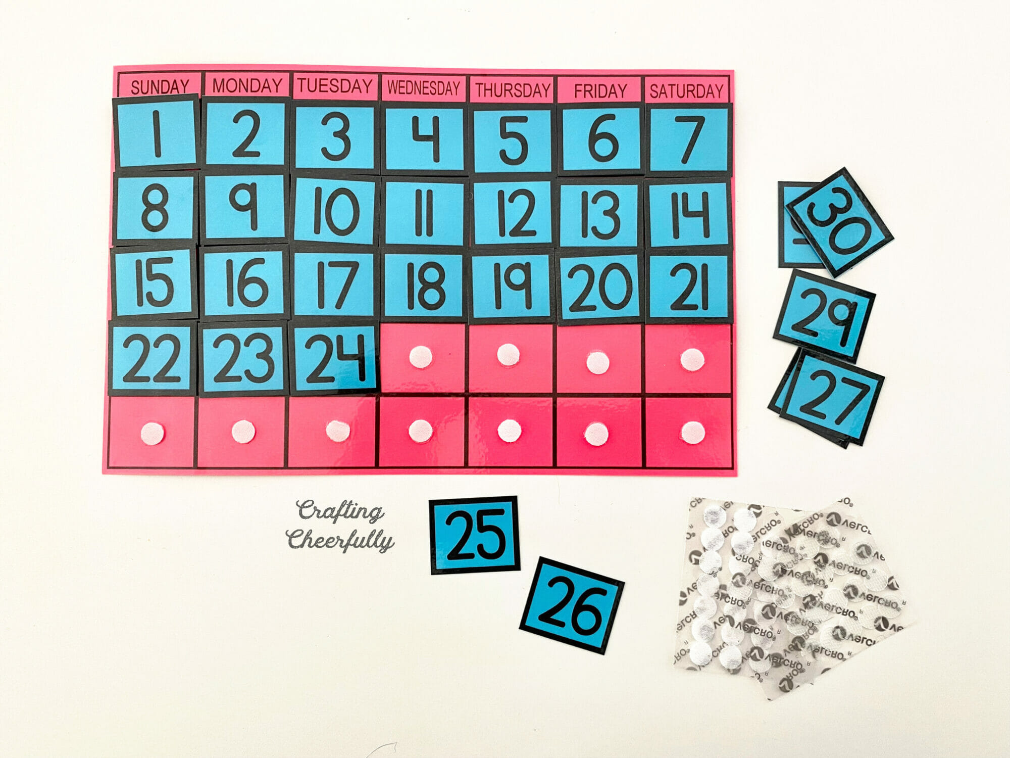 Velcro Thin Clear Fasteners are used to attach dates to a calendar printable.
