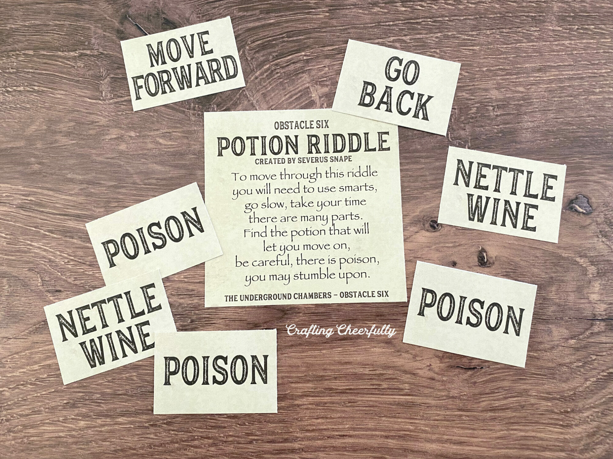Obstacle six card lays on a table with smaller cards that read Poison, Nettle Wine and more.