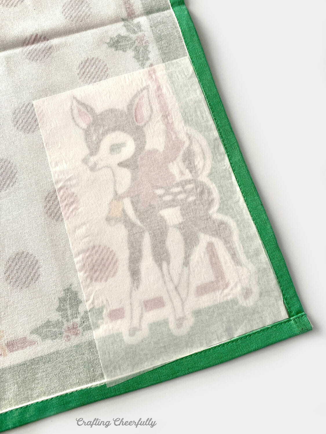 Fabric napkin with fusible interfacing ironed on to it.