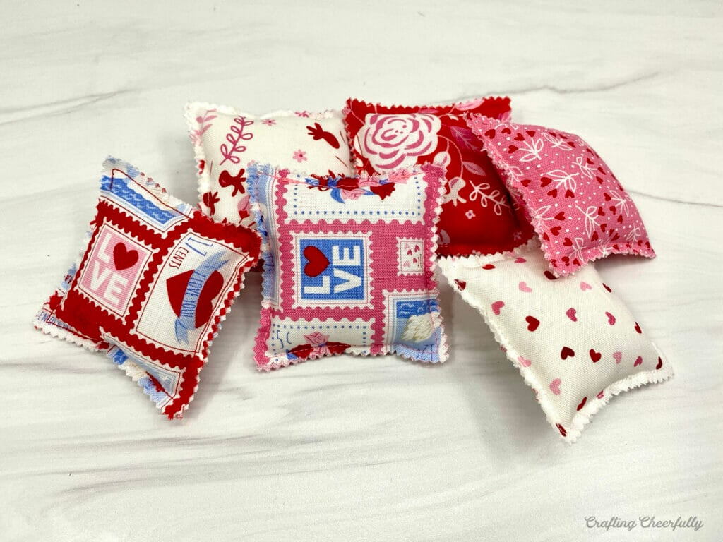 Mini pillows made from a mini charm pack.