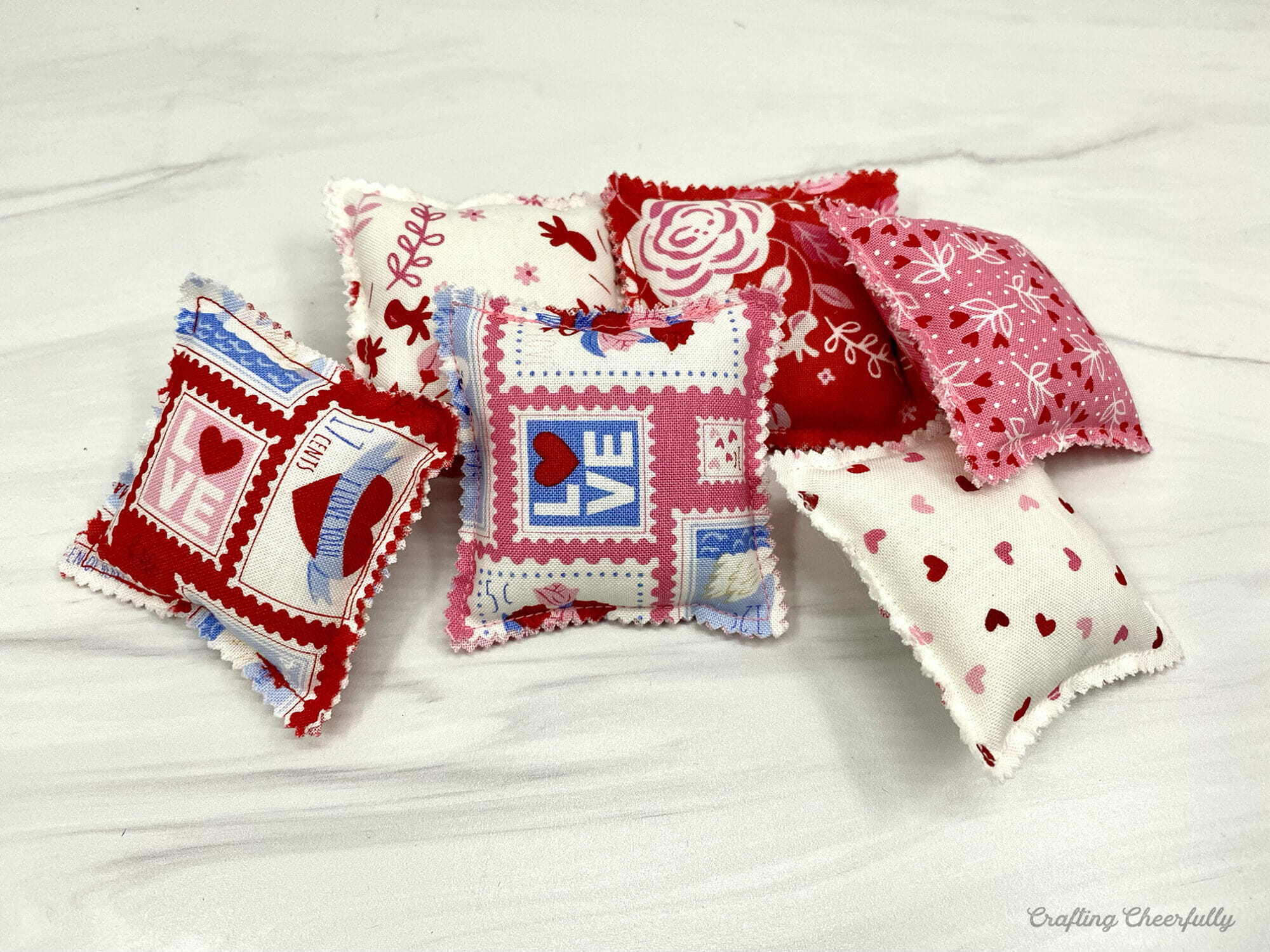 Mini pillows made from a mini charm pack.