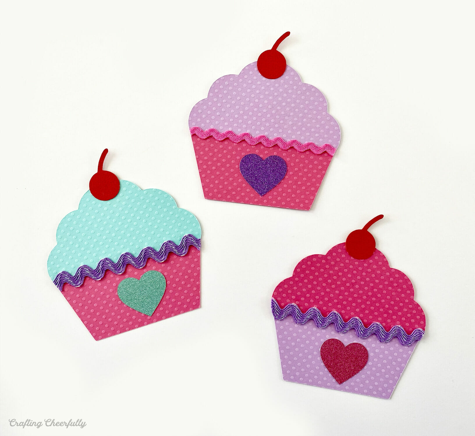 Paper cherries are added to the top of each cupcake banner pennant.