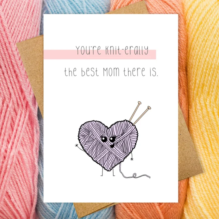 Mother's Day card that reads "You're Knit-erally the best mom there is' with a heart shaped ball of yarn.