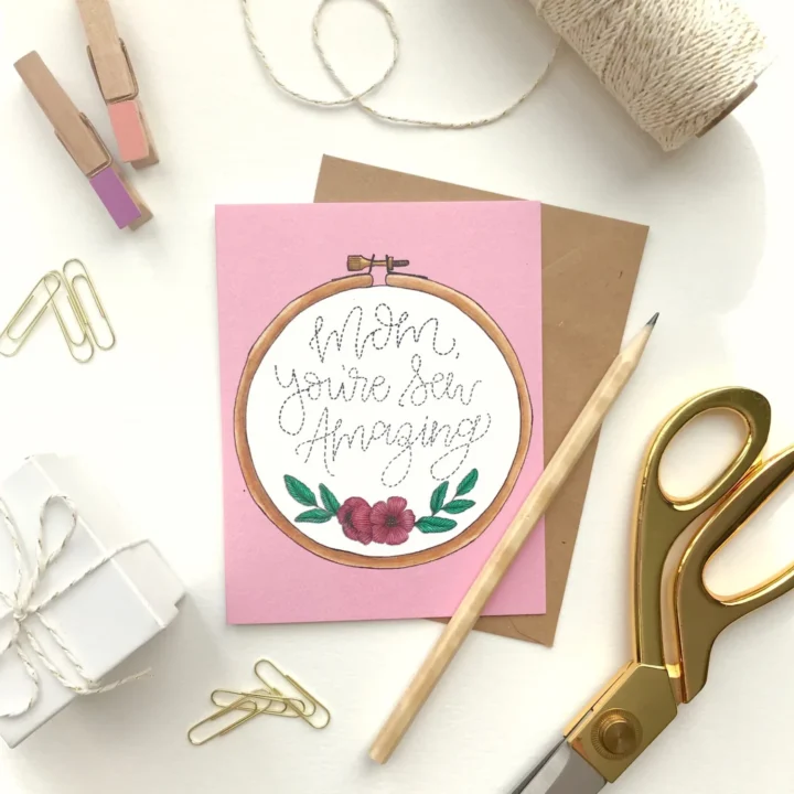 Mother's Day card with an embroidery hoop that reads 'Mom You're Sew Amazing' in the center.