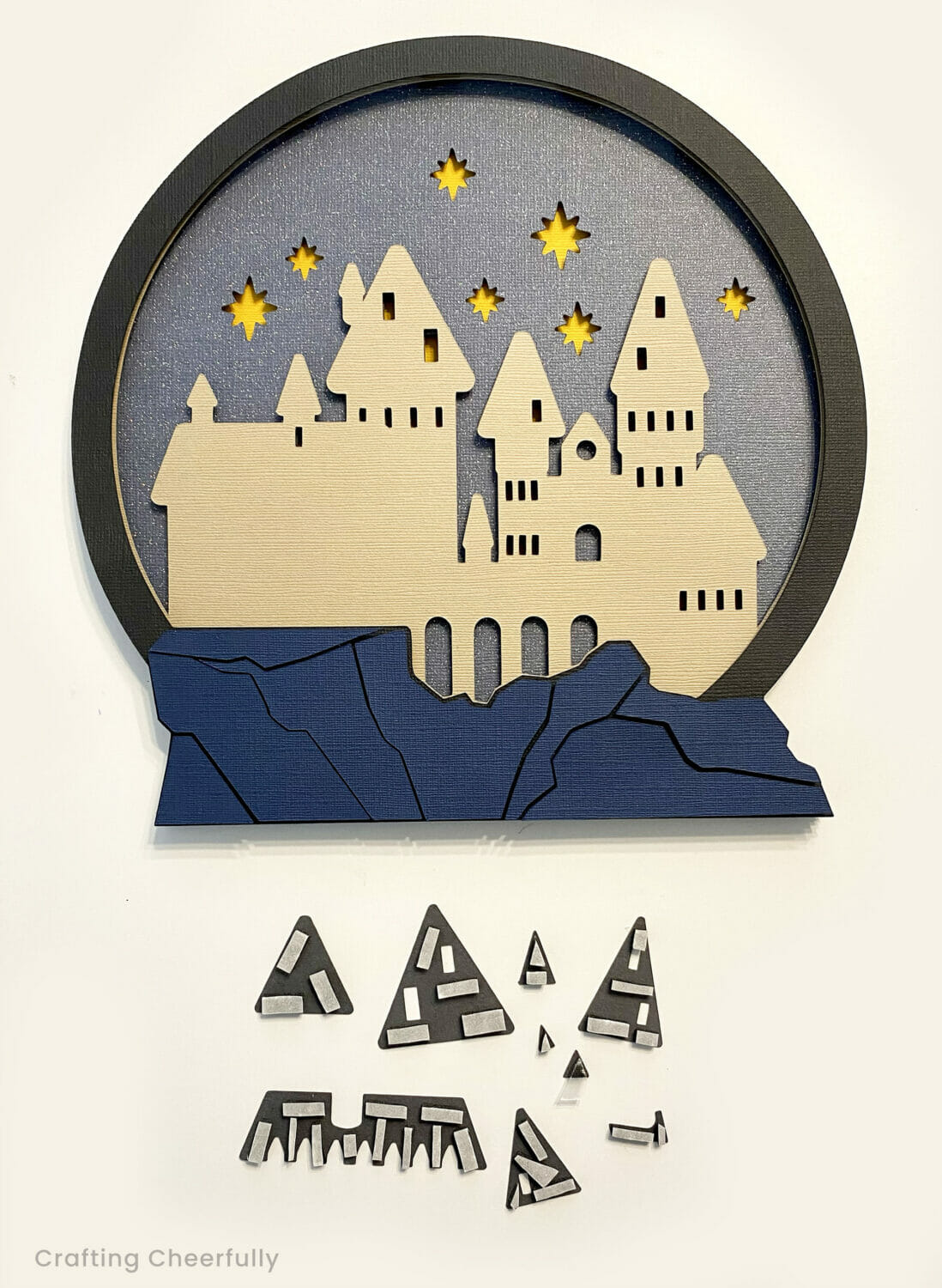 Small gray roof pieces are added to the castle.
