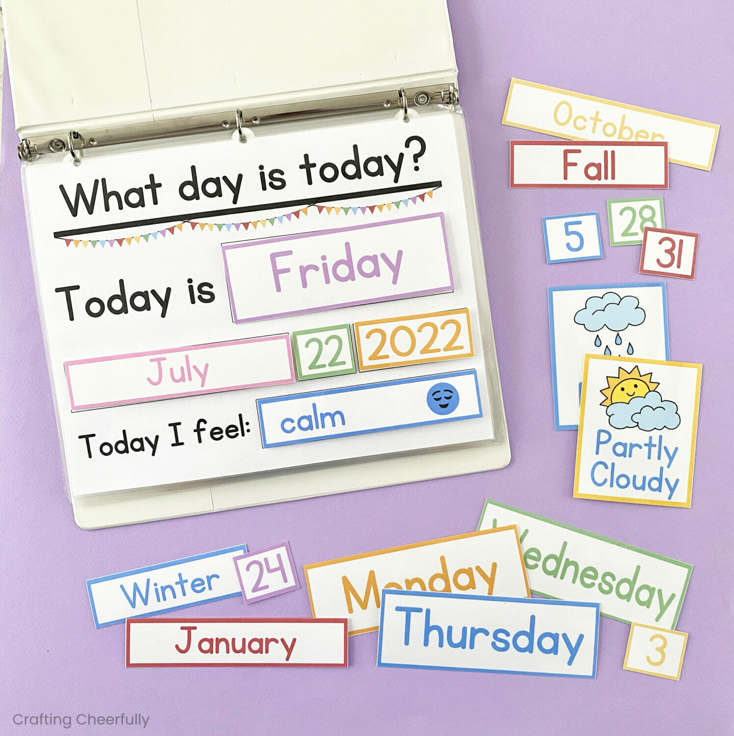 The calendar busy book is open to a page that reads "What day is today?; calendar cards list the day of the week, date and emotion.