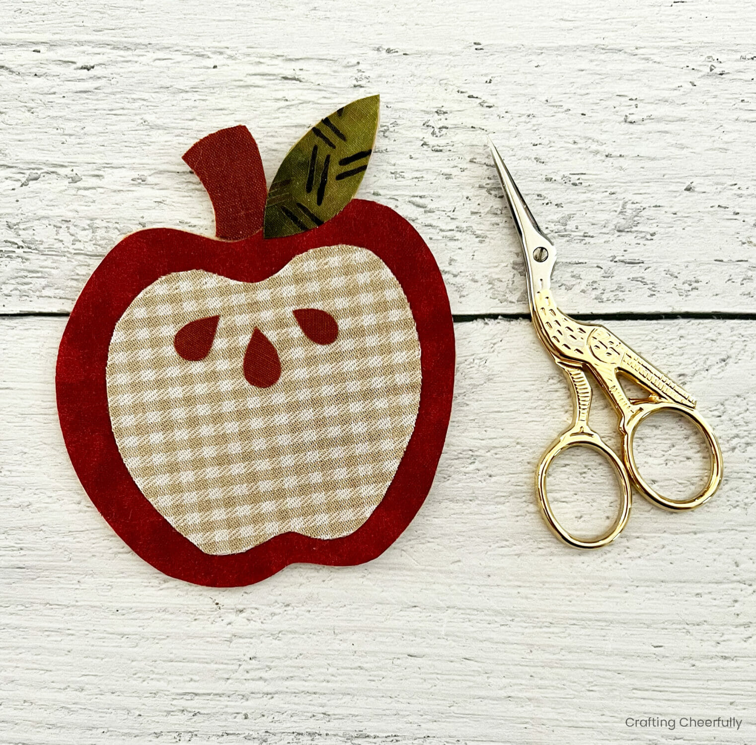 Apple pennant is trimmed so no felt is showing.