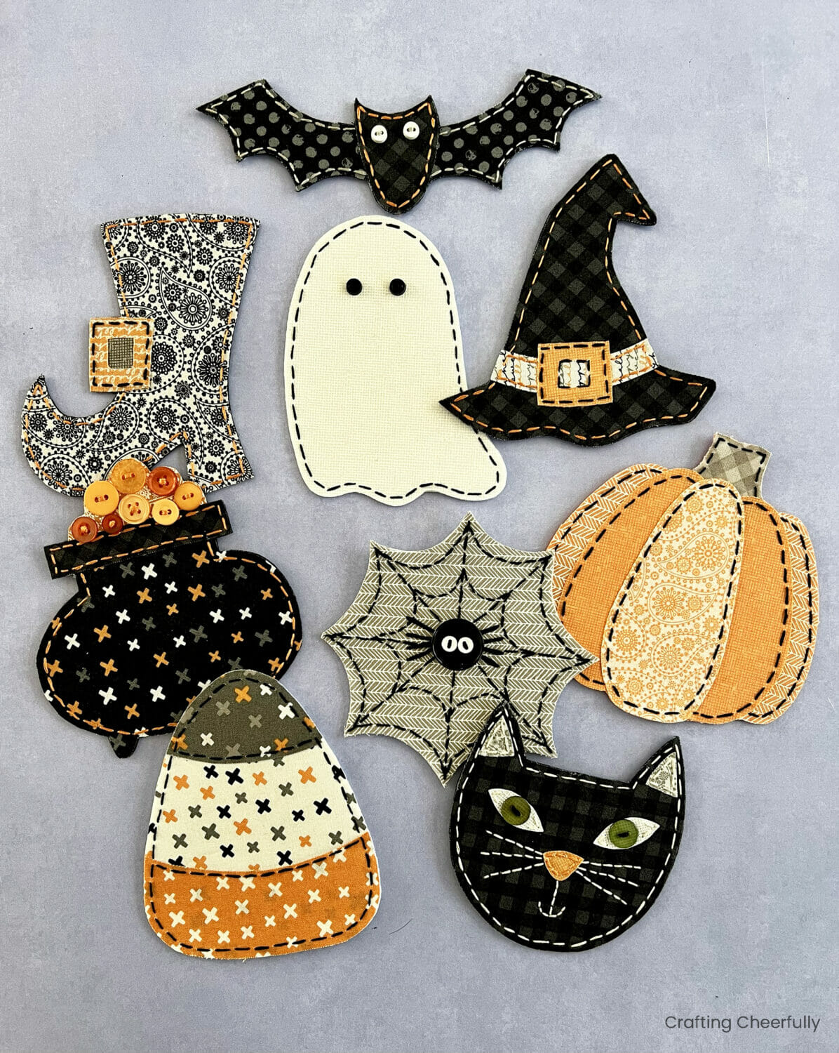 Halloween pennants made from fabric and embroidered.