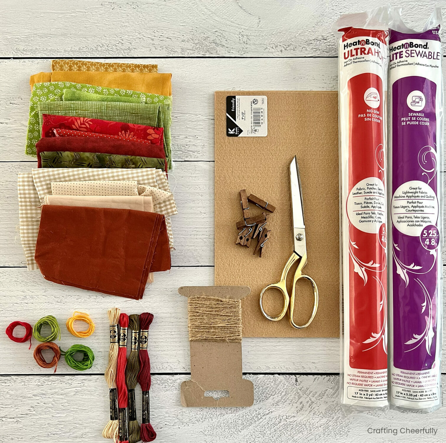 Fabric scraps, felt, embroidery floss, twine, clothespins and fusible interfacing.