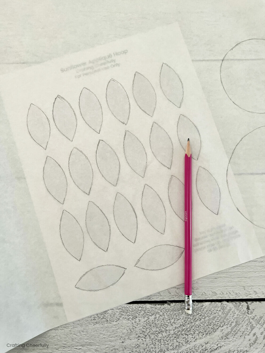Petals are traced onto fusible web interfacing with a pencil.