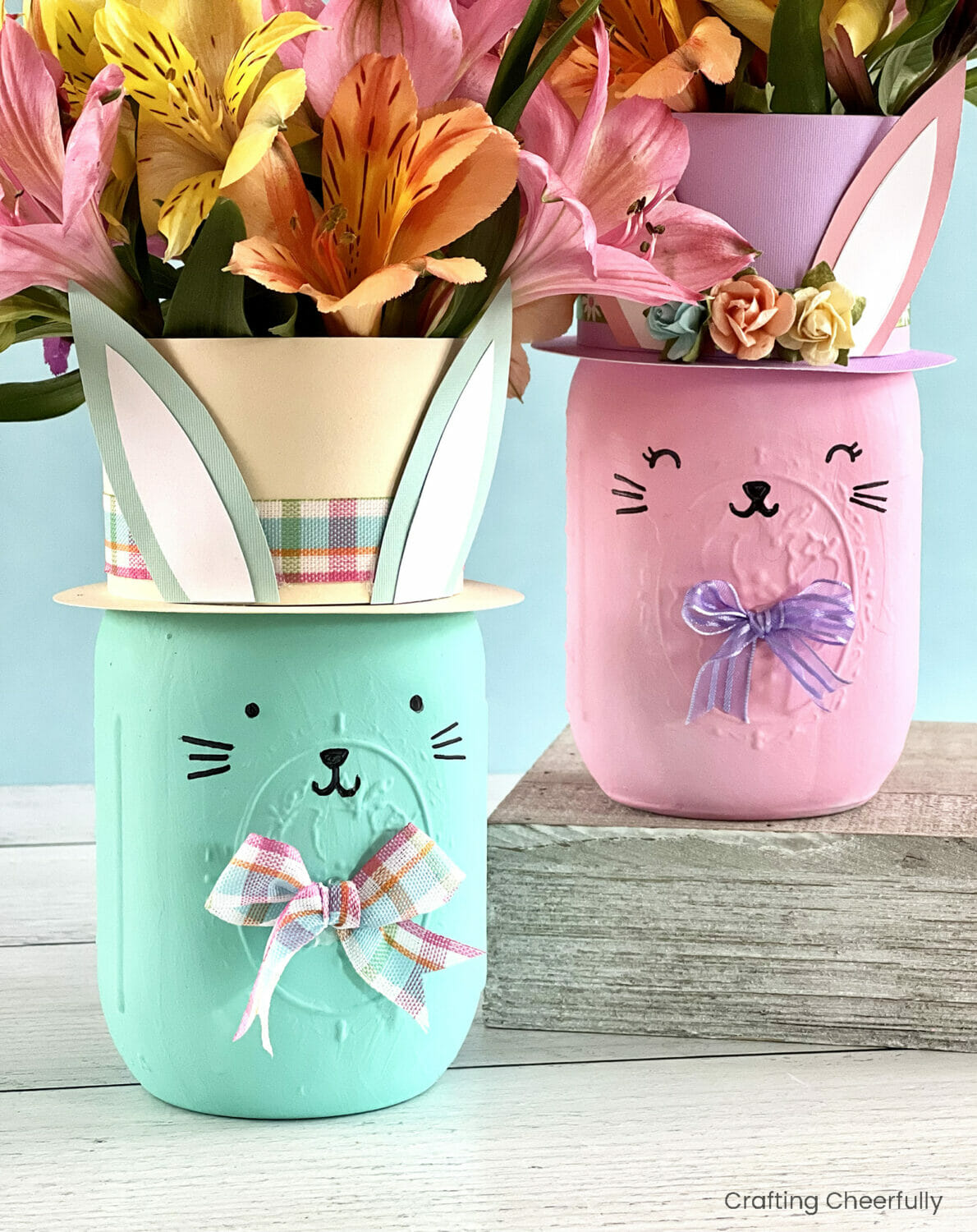 https://www.craftingcheerfully.com/wp-content/uploads/2023/03/DIY-Easter-Bunny-Mason-Jar-Vases.jpg