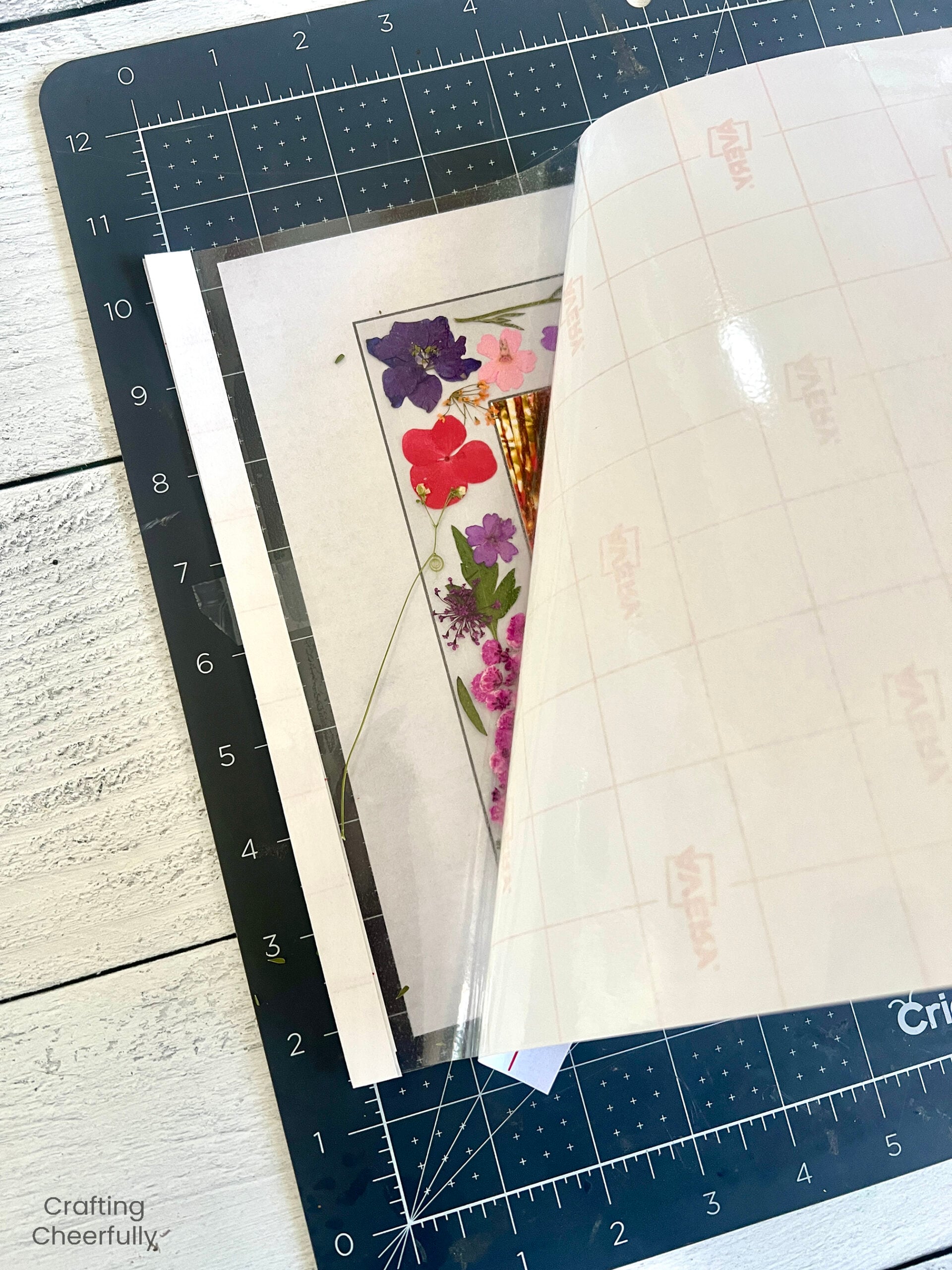 Second top layer of lamination added over the flowers.