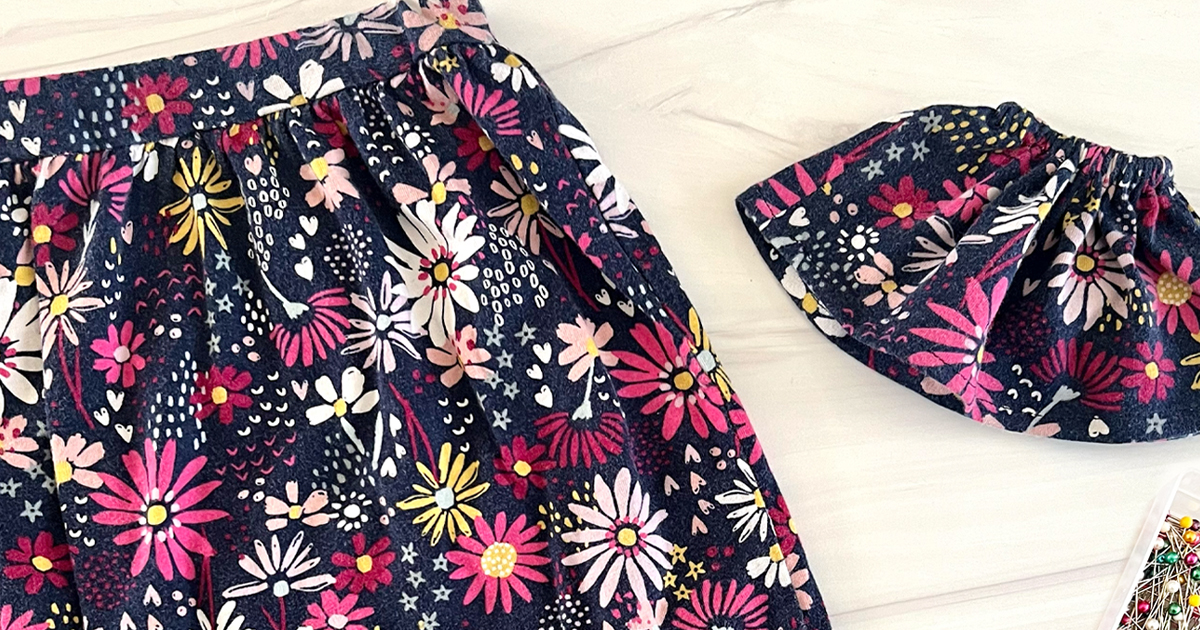 Doll and girl matching skirts.