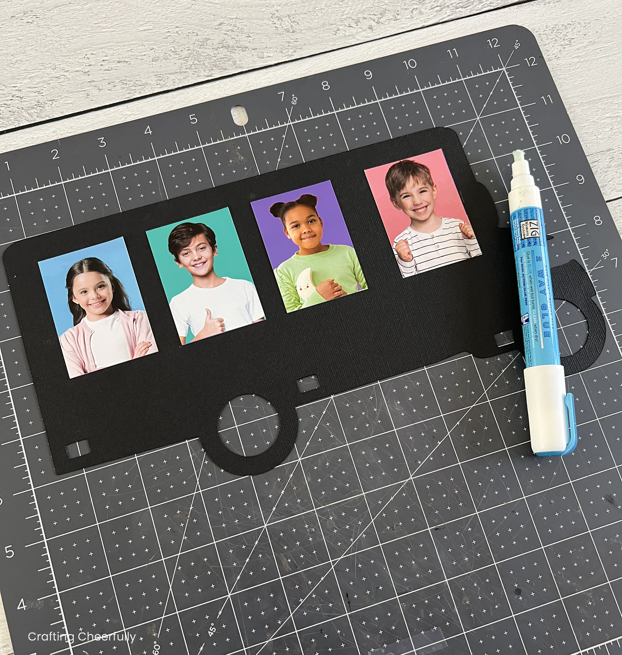 Pictures are glued to the black layer of paper.